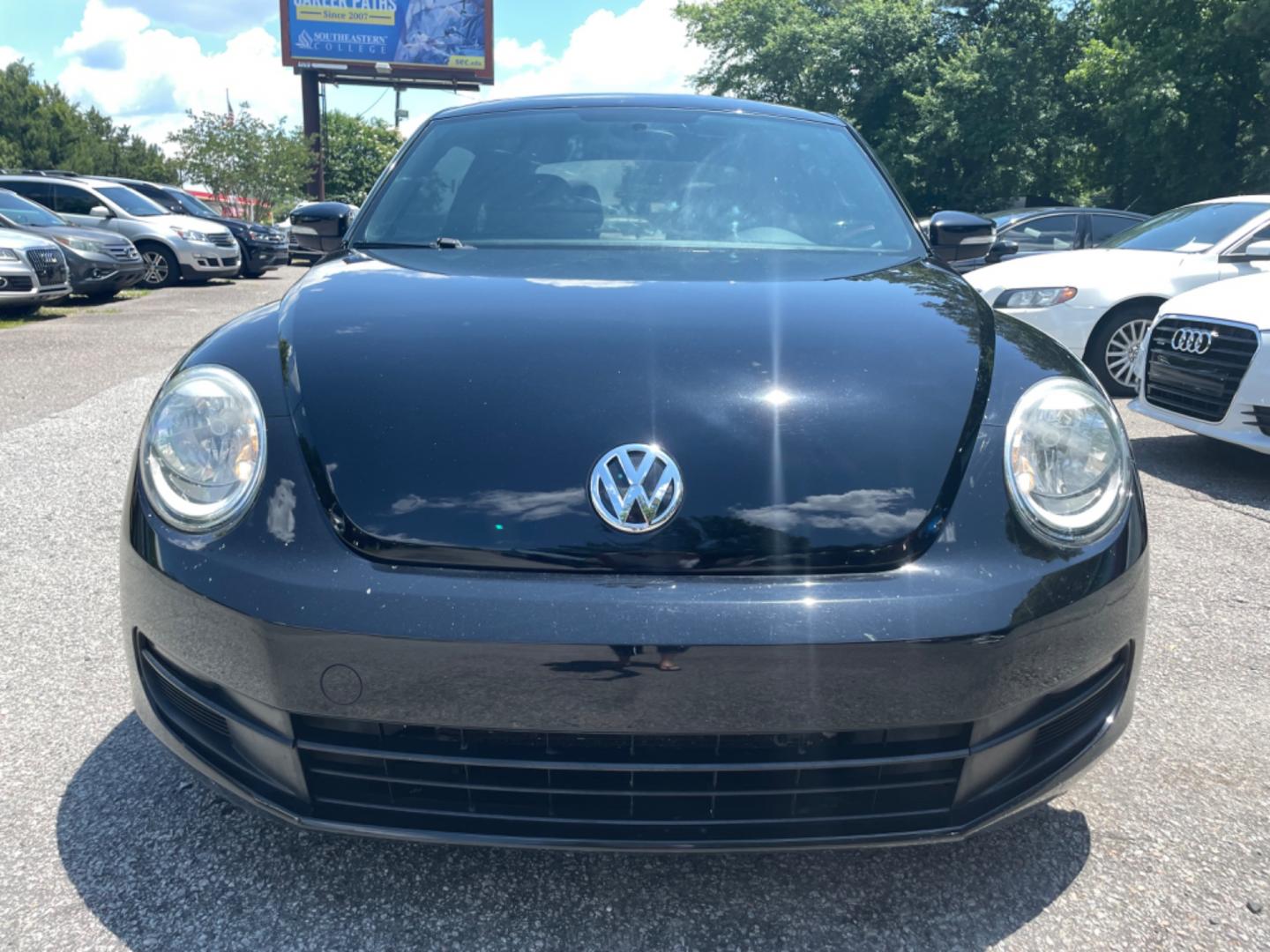 2012 BLACK VOLKSWAGEN BEETLE 2.5L PZEV (3VWJP7AT0CM) with an 2.5L engine, Automatic transmission, located at 5103 Dorchester Rd., Charleston, SC, 29418-5607, (843) 767-1122, 36.245171, -115.228050 - Local Trade-in with Leather, CD/AUX/Bluetooth, Hands-free Phone, Power Windows, Power Locks, Power Mirrors, All-weather Mats, Keyless Entry, Alloy Wheels. Clean CarFax (no accidents reported!) Only 68k miles! Located at New Life Auto Sales! 2023 WINNER for Post & Courier's Charleston's Choice Pre - Photo#1